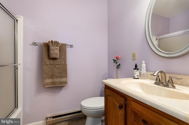 bathroom with an enclosed shower, baseboard heating, toilet, and vanity