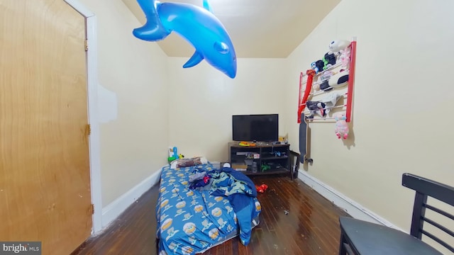 playroom featuring hardwood / wood-style floors and baseboards