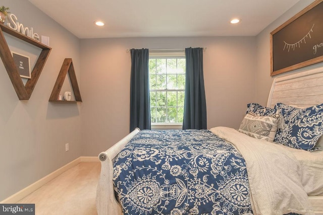 bedroom with recessed lighting, baseboards, and carpet