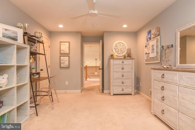 bedroom with light carpet, recessed lighting, and baseboards