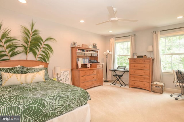 carpeted bedroom with a ceiling fan, recessed lighting, and baseboards