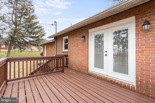 wooden deck with a yard