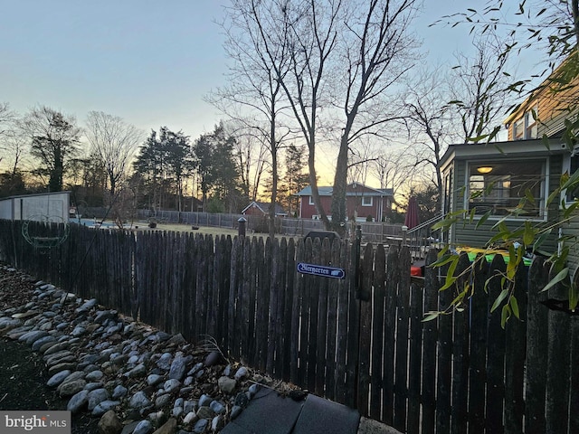 yard at dusk with fence