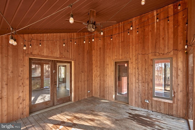 wooden deck with a ceiling fan