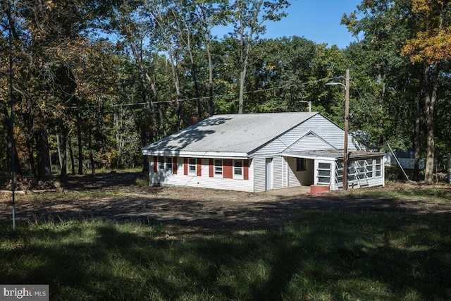 view of front of home with a front yard