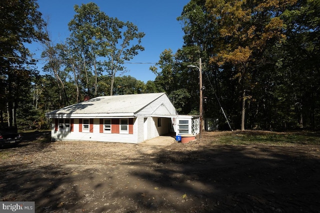 view of front of home with metal roof