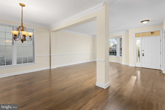 9 Quaker St, Chesterfield, NJ 08515 - foyer entrance featuring baseboards, dark wood-style flooring, ornamental molding, and an inviting chandelier