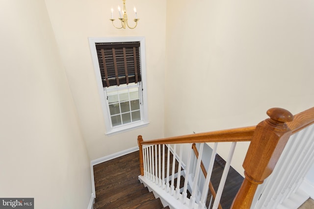 9 Quaker St, Chesterfield, NJ 08515 - stairway featuring baseboards, wood finished floors, and a notable chandelier