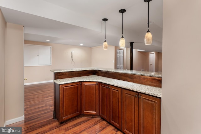9 Quaker St, Chesterfield, NJ 08515 - kitchen featuring baseboards, wood finished floors, recessed lighting, decorative light fixtures, and light stone counters