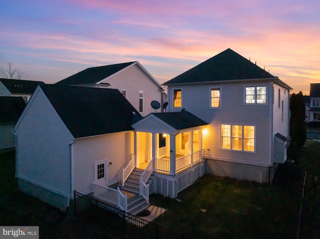 9 Quaker St, Chesterfield, NJ 08515 - back of house at dusk featuring a porch and a yard