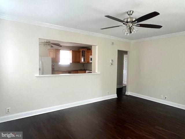 unfurnished living room with dark wood-style flooring, a ceiling fan, and crown molding