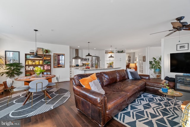 living room with recessed lighting and dark wood-type flooring