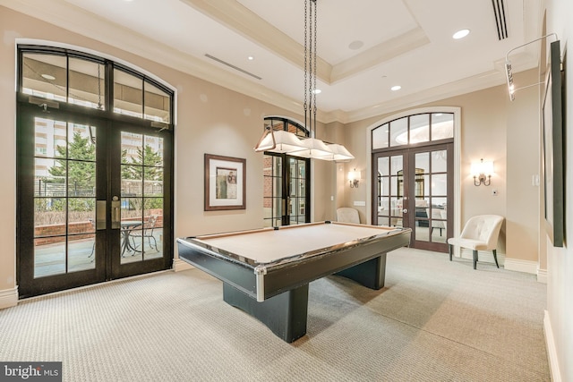 game room with ornamental molding, french doors, plenty of natural light, and light carpet