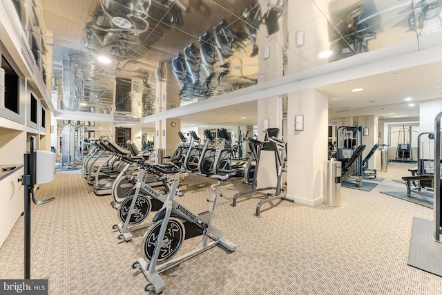 exercise room with carpet flooring