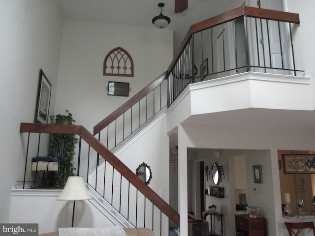 stairway with a high ceiling