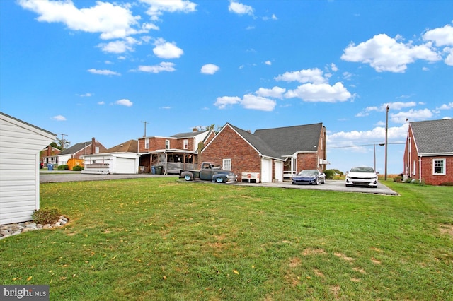 view of yard featuring an attached garage