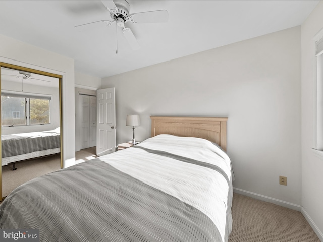 bedroom with carpet flooring, ceiling fan, and baseboards