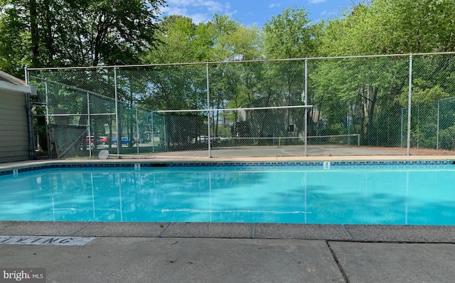 pool featuring fence