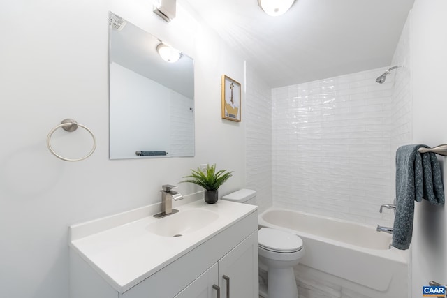 full bathroom featuring vanity, toilet, and bathtub / shower combination