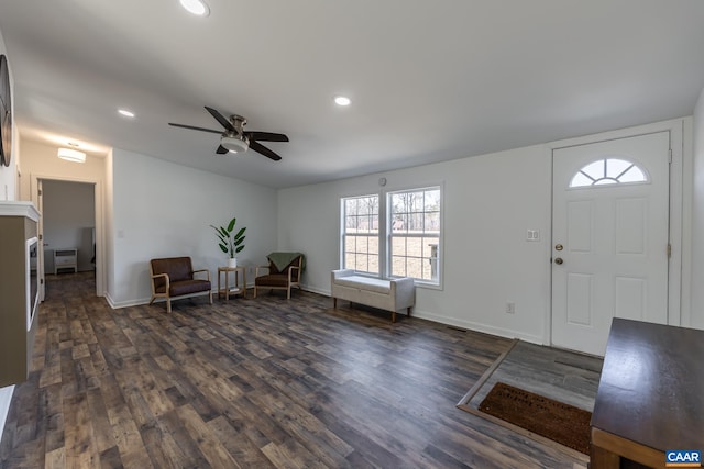 entryway featuring dark wood-style floors, recessed lighting, and baseboards