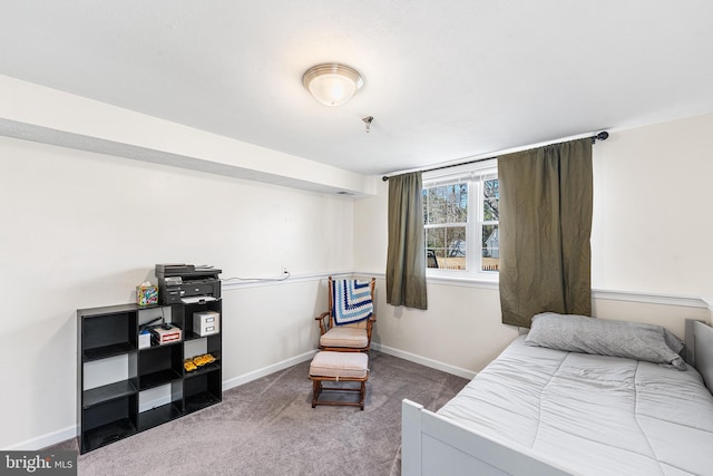 carpeted bedroom with baseboards