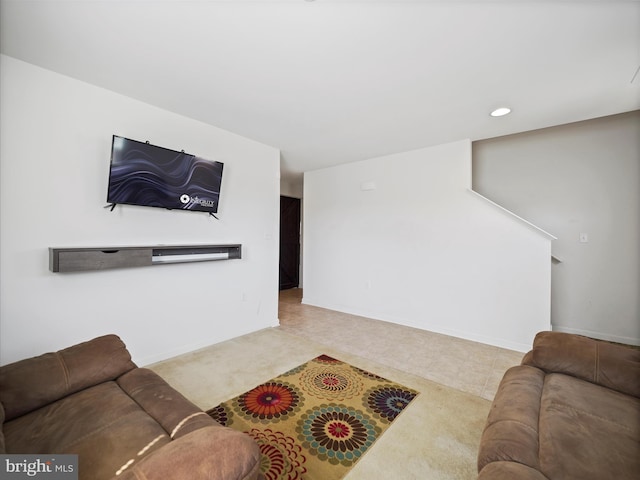 carpeted living room featuring recessed lighting and baseboards