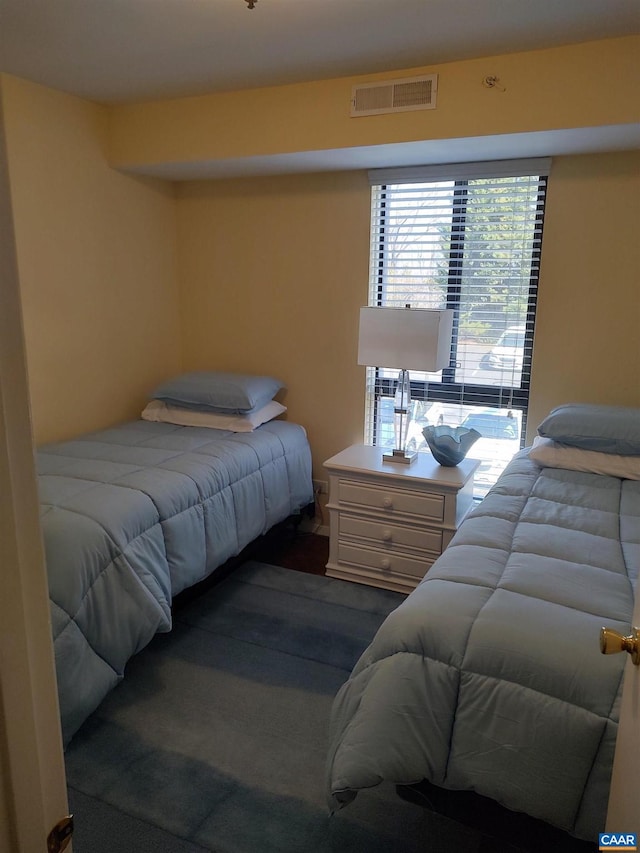 bedroom with visible vents