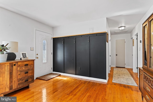 entrance foyer with light wood-type flooring