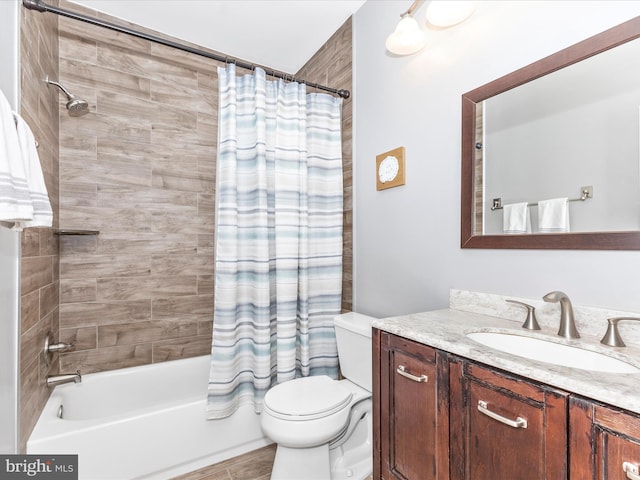 full bathroom with vanity, toilet, and shower / bath combo