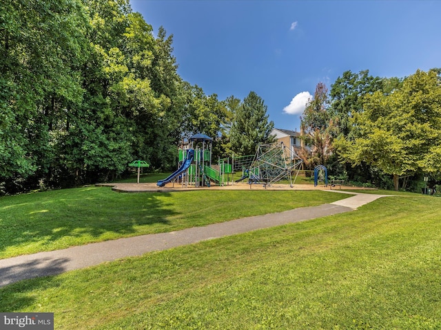 community playground featuring a yard