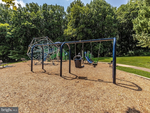 communal playground with a lawn