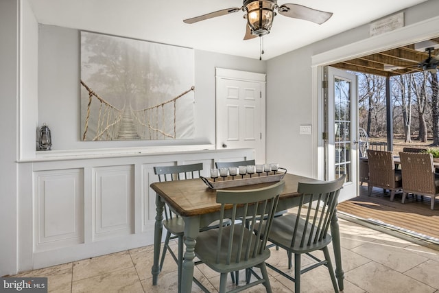 dining room featuring ceiling fan