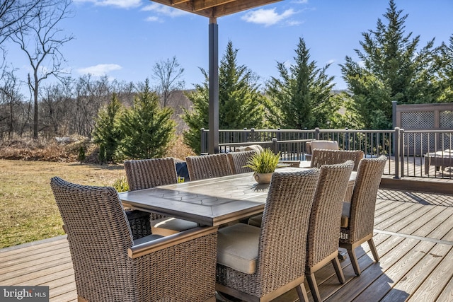 deck featuring outdoor dining area