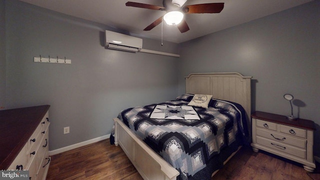 bedroom with an AC wall unit, a ceiling fan, baseboards, and dark wood-style flooring