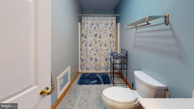 bathroom featuring visible vents, a shower with curtain, tile patterned flooring, and toilet