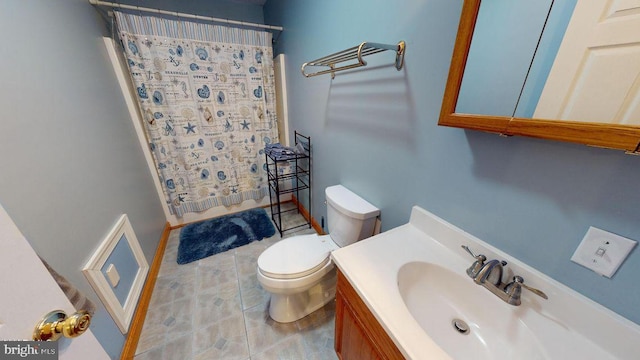 bathroom with vanity, toilet, and visible vents