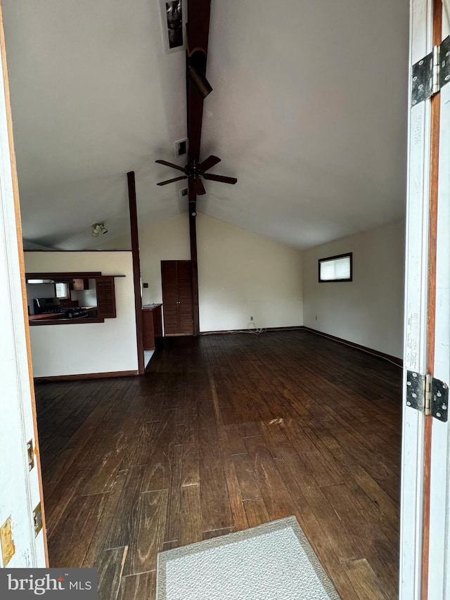 unfurnished living room with visible vents, baseboards, lofted ceiling, a ceiling fan, and wood-type flooring