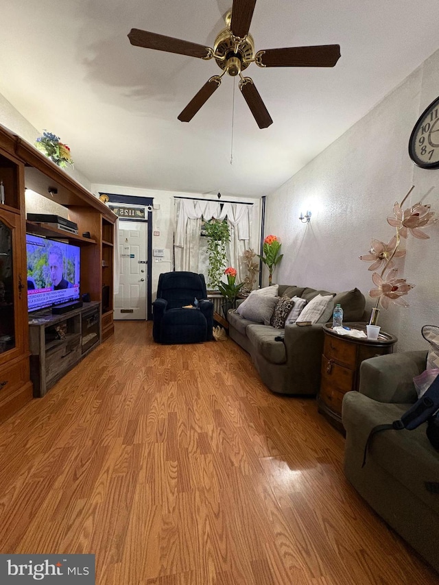 unfurnished living room with wood finished floors