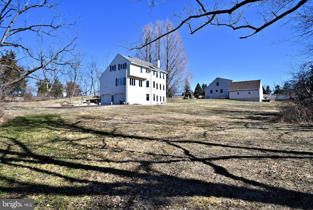 view of home's exterior with a chimney