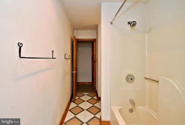 full bathroom with tile patterned flooring, baseboards, and bathtub / shower combination