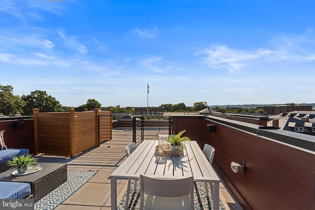 view of patio / terrace with a balcony