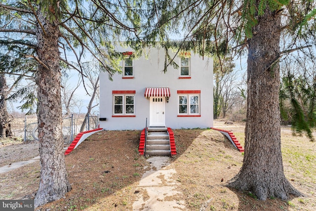 view of front of property featuring stucco siding