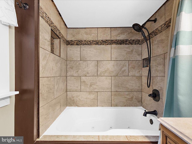 full bathroom with vanity and a combined bath / shower with jetted tub