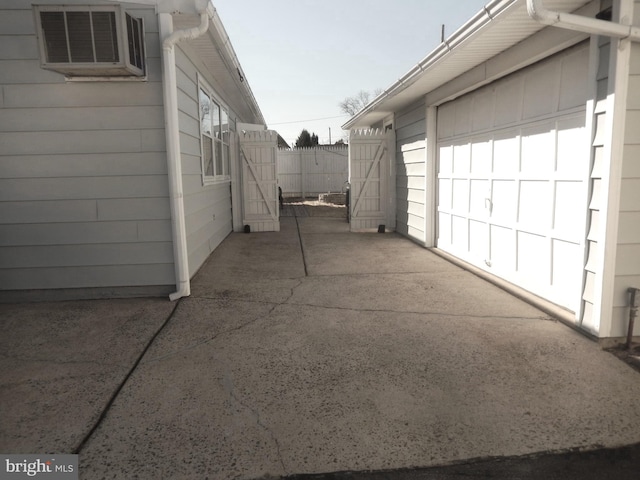 garage with fence