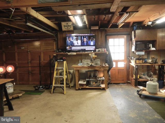 garage with a workshop area