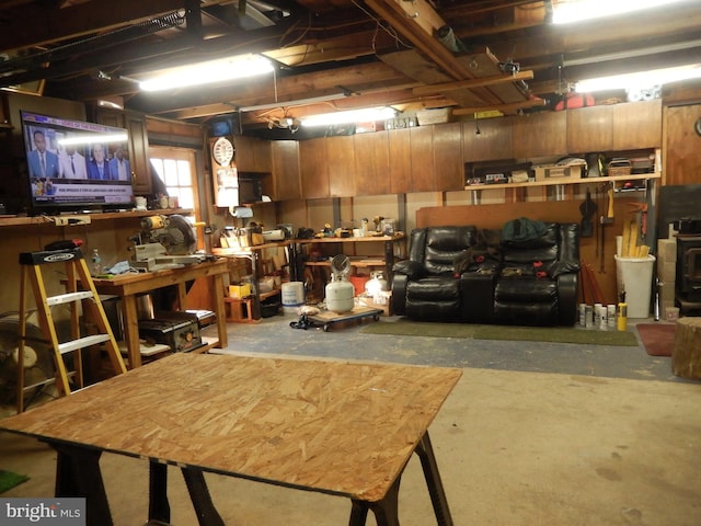 basement with a workshop area
