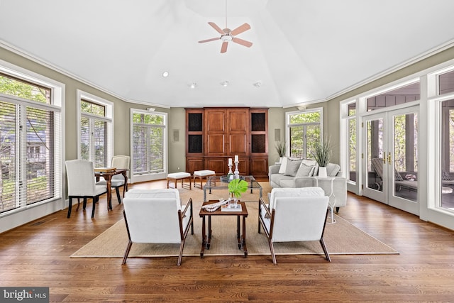 sunroom / solarium featuring french doors and plenty of natural light