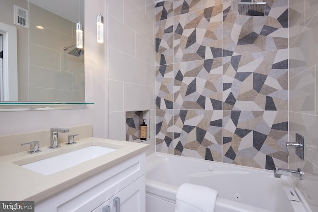 bathroom featuring visible vents and vanity