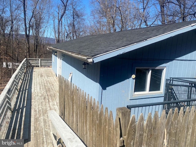 view of home's exterior featuring a shingled roof