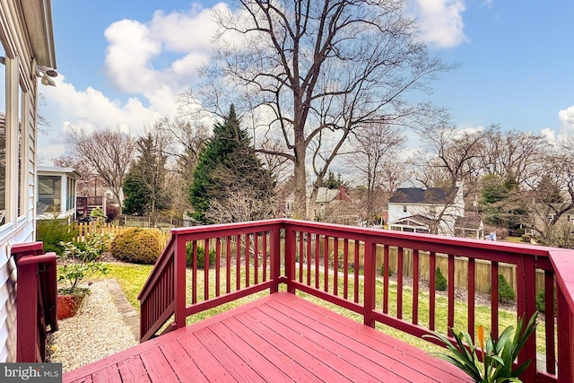 wooden deck featuring fence